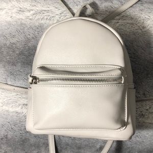 Mini grey back pack